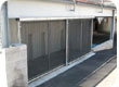Overhead track slide gate