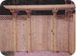 Solid with lattice and trellis wood fence