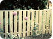 Wolmanized picket flat top wood fence