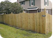 Scallped wood fence solid