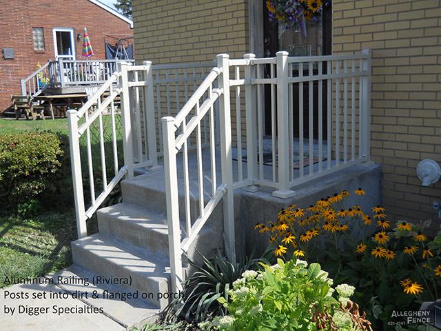 Aluminum Railing (Riviera) Posts Set Into Dirt & Flanged on Porch by Digger Specialties